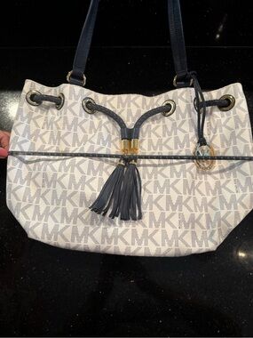 Michael Kors Cream MK Logo Drawstring Shoulder Bag with Navy Trim